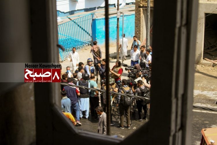 A group of journalists engages with Taliban fighters and local civilians in Afghanistan, illustrating the complex dynamics and challenges faced by media professionals in a landscape of censorship and suppression. (Photo Credit: 8am.media)