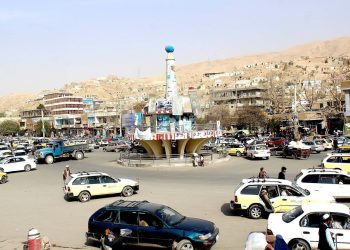 Busy traffic at a roundabout in Baghlan, Afghanistan, with a view of the surrounding buildings and hills. (Photo Credit: Social Media)