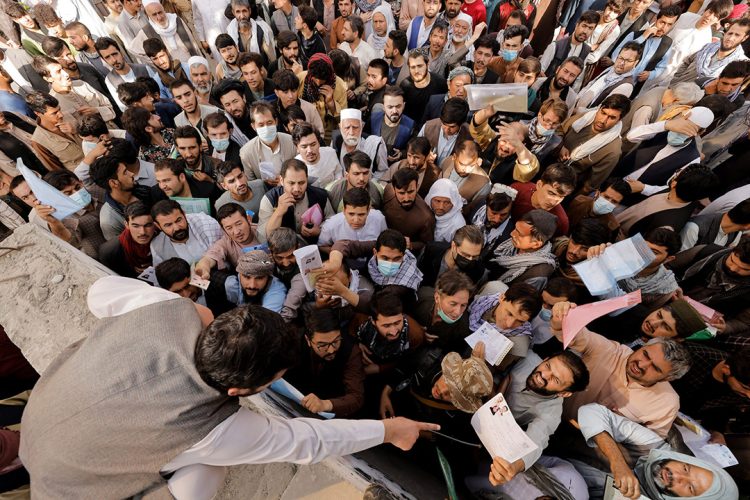 A crowded scene at an ID registration center in Kabul, as citizens face long waits and bureaucratic hurdles to obtain electronic IDs. (Photo Credit: REUTERS)