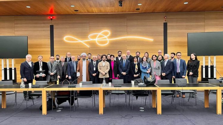 A gathering of the Afghanistan diaspora engaging in discussions about the country's future at an international conference. (Photo Credit: @alinazary)