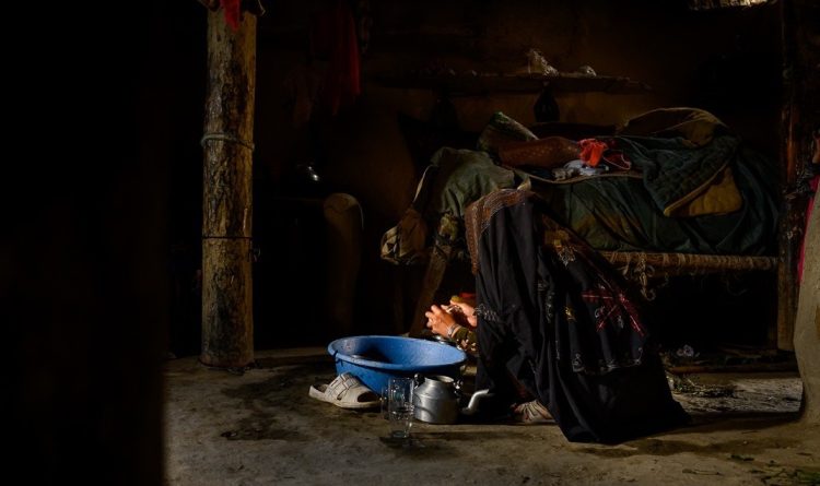 A woman washes her hands inside her modest home in Afghanistan, highlighting the everyday struggles faced by millions amid the country’s worsening humanitarian crisis. (Photo Credit: OCHA)