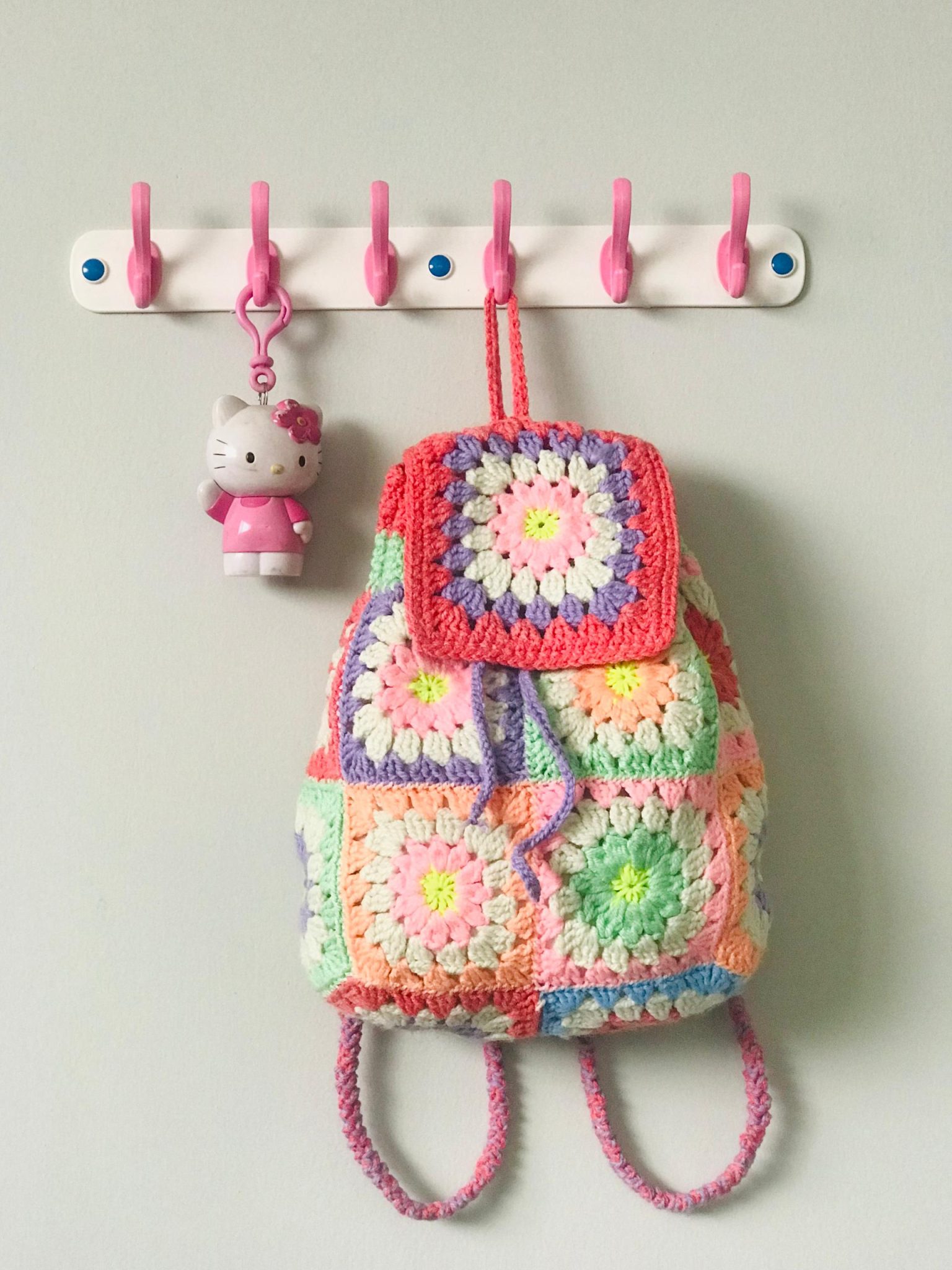 Colorful crocheted backpack with Hello Kitty charm, crafted for World Handicrafts Day. (Photo Credit: Exclusive)