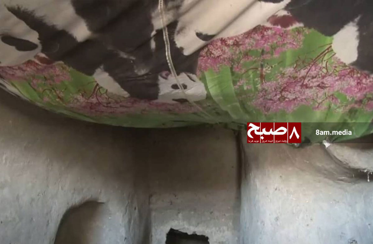 A makeshift ceiling in a crumbling home in the Old City of Ghazni illustrates the desperate living conditions.