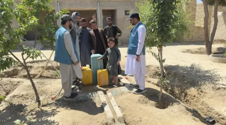 Local residents in Jawzjan province collect clean water from a newly installed solar-powered pipeline, supported by OCHA and partners. (Photo Credit: OCHA)