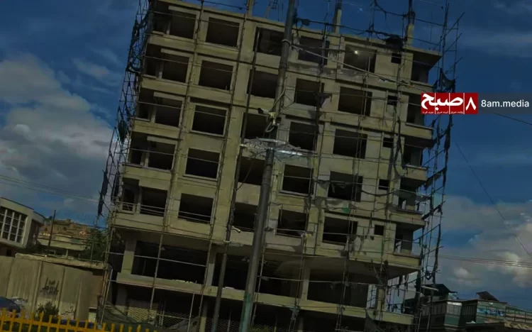 A multi-story residential building under construction in Kabul, where Taliban officials allegedly issue permits for additional floors in exchange for bribes, contributing to uncontrolled urban development and environmental concerns. (Photo Credit: 8am.media)