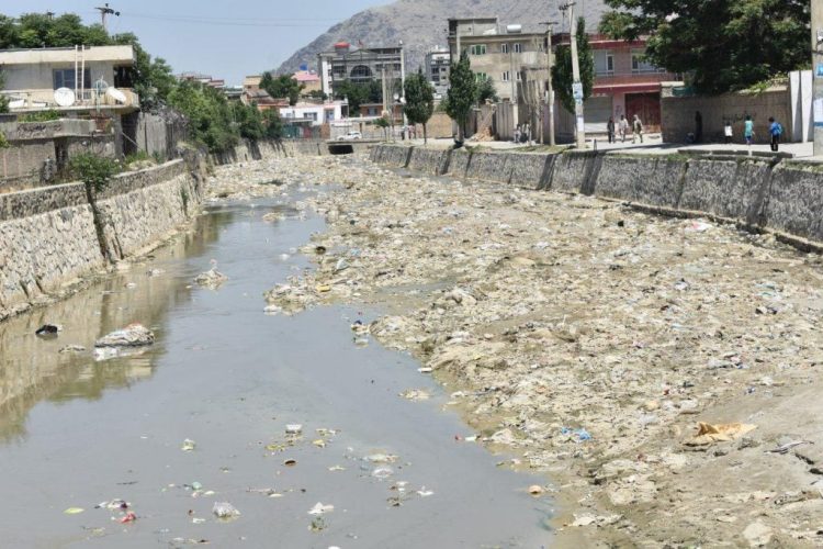 A polluted waterway in Kabul shows contaminated water and debris, highlighting the city's sewage management crisis that threatens groundwater resources and public health. (Photo Credit: Social Media)