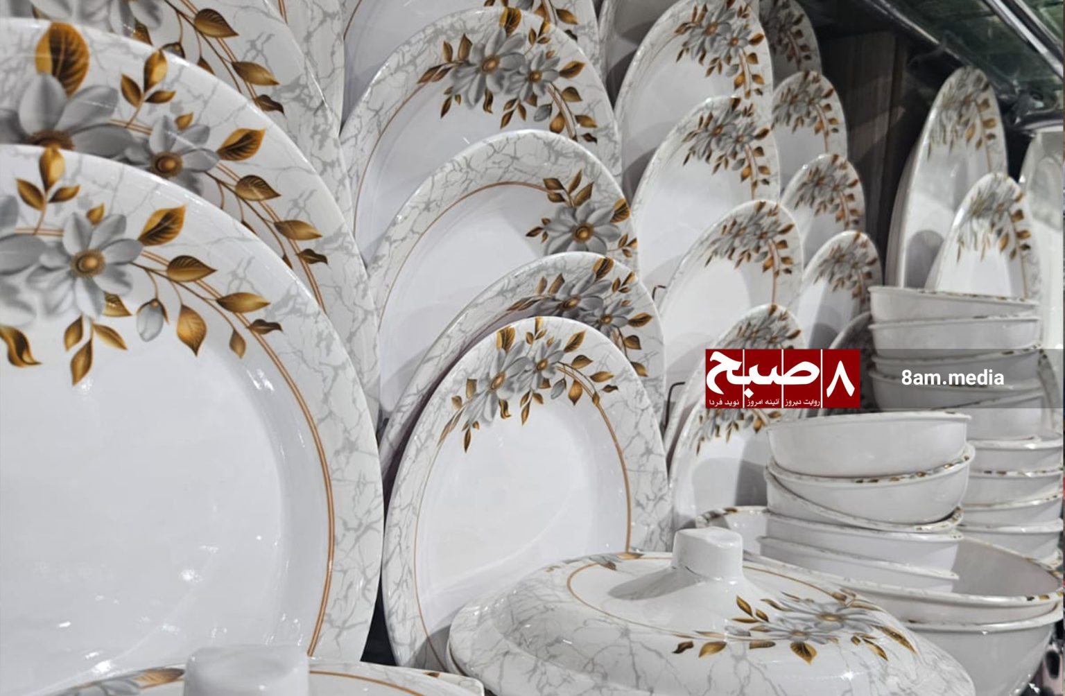 Porcelain dinnerware sets displayed at a Kabul market. (Photo Credit: 8am.media)