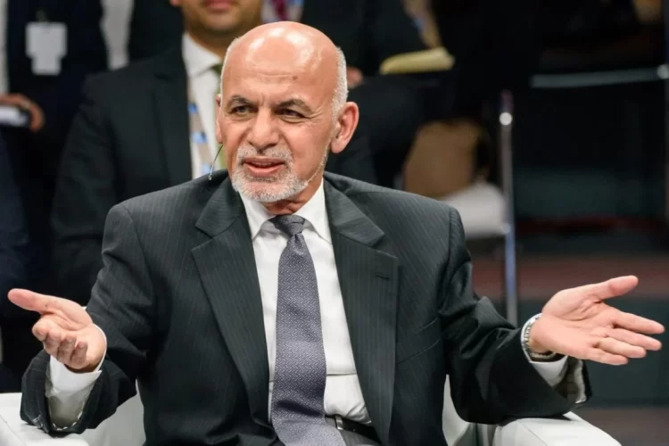 Mohammad Ashraf Ghani speaking at an event, gesturing with both hands. (Photo Credit: Social Media)