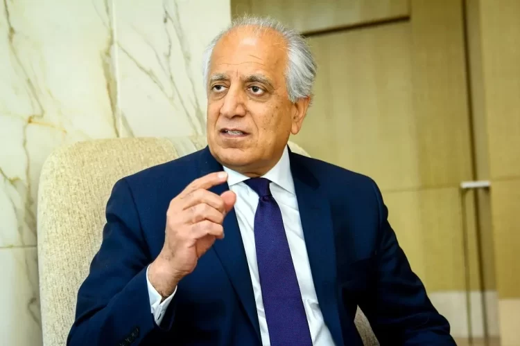 Zalmay Khalilzad gestures during a discussion, reflecting his influential yet controversial role in Afghan politics. (Photo Credit: Social Media)