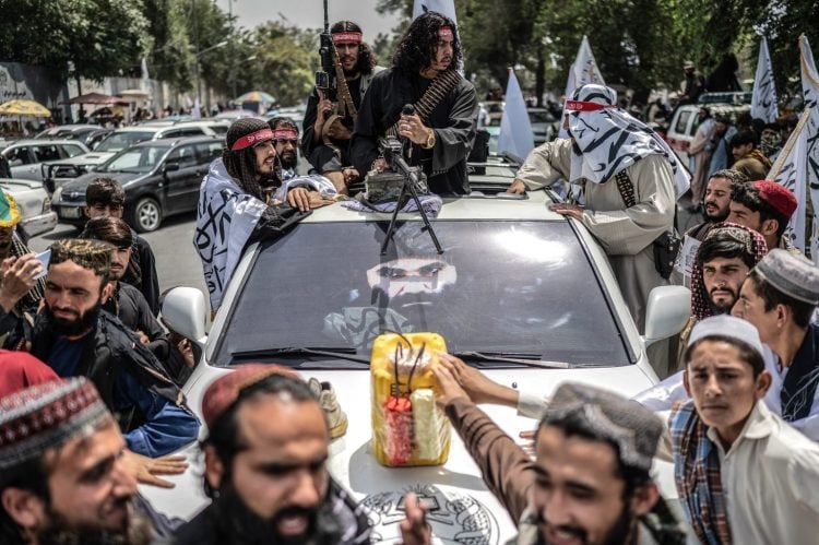 Taliban fighters mark their return to power with an armed rally in Kabul. (Photo Credit: AFP)