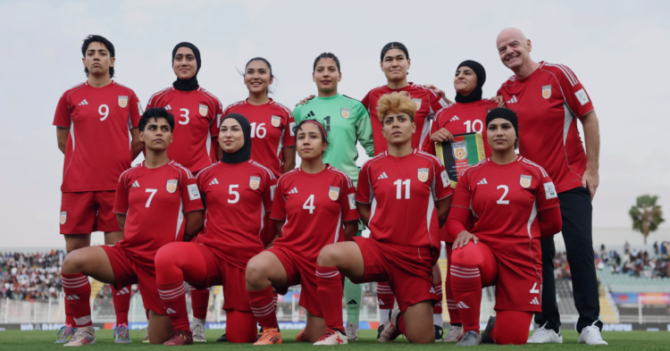 The Afghan Women United team poses for a team photo before their match in the FIFA Unites: Women's Series 2025, marking their historic return to international competition after a four-year absence following the Taliban's takeover of Afghanistan. (Photo Credit: FIFA)