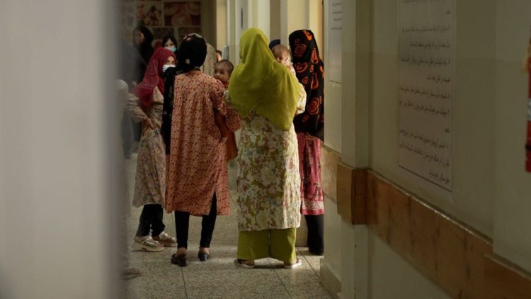 Women and children wait in a hospital corridor in Badakhshan province, Afghanistan, where child malnutrition has reached crisis levels with one child dying every three days. (Photo Credit: Sky News)