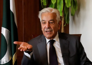 Pakistan's Defense Minister Khawaja Muhammad Asif speaks during an interview, accusing elements in Kabul of obstructing peace negotiations with the Taliban. (Photo Credit: Reuters)