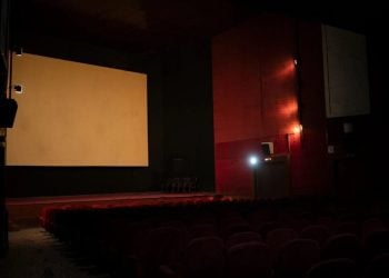 An empty cinema hall in Afghanistan stands in darkness, symbolizing the silencing of the country's once-vibrant film industry under Taliban rule. The vacant seats and illuminated screen serve as a haunting reminder of the artistic voices that have been suppressed and the cultural heritage at risk of erasure. (Photo Credit: AP)