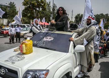 Taliban fighters patrol Kabul amid a nationwide internet and telecommunications blackout that has left ordinary citizens cut off while only international organizations maintain connectivity through VSAT. (Photo Credit: Wakil KOHSAR / AFP)