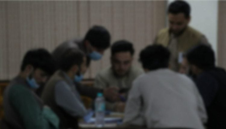 Afghan students wait for visa processing at an administrative office, facing uncertainty about their educational future in Pakistan as the suspension of student visa issuance leaves hundreds stranded. (Photo Credit: adroitassociates)