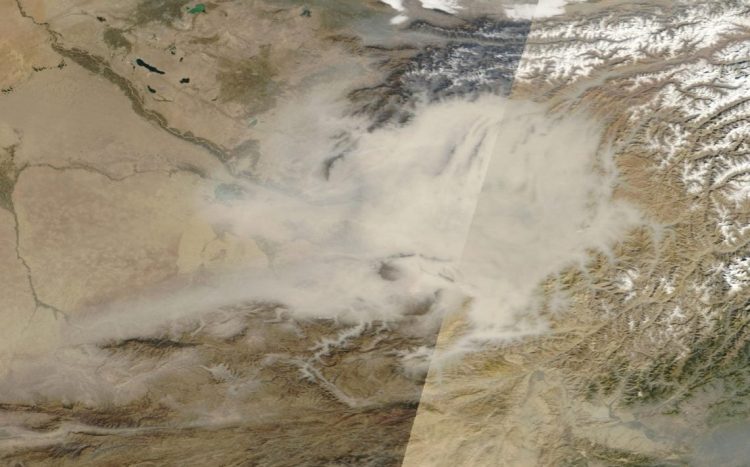 Satellite imagery captures a massive dust storm sweeping across northern Afghanistan, where intensifying storms driven by drought and land degradation have severely impacted air quality and daily life in regions like Balkh province. (Photo Credit: NASA)