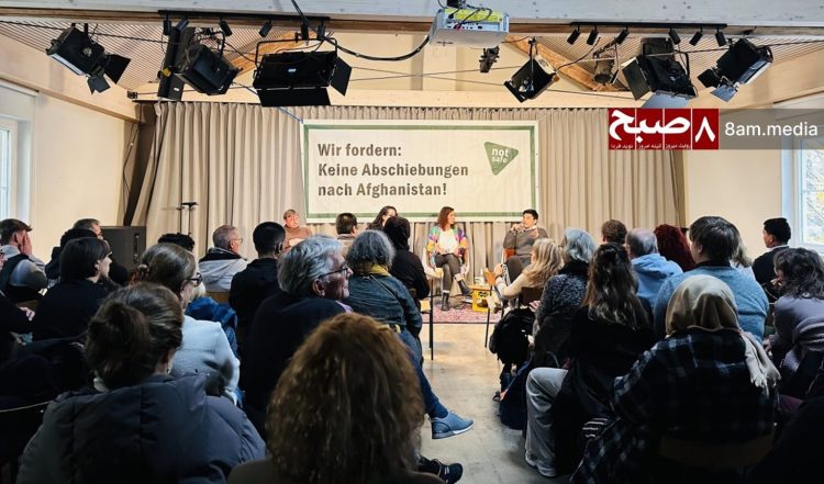 Civil society activists, journalists, and representatives gather at the "Afghanistan Is Not Safe" conference in Munich, Germany, calling for international attention to the humanitarian crisis and demanding protection for Afghan asylum seekers facing deportation. (Photo Credit: 8am.media)