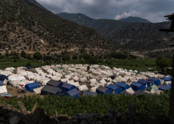 Displaced families affected by the August 2025 earthquake in eastern Afghanistan live in temporary shelters as winter approaches, facing severe cold and lack of adequate heating amid economic hardship. (Photo Credit: Al Jazeera)