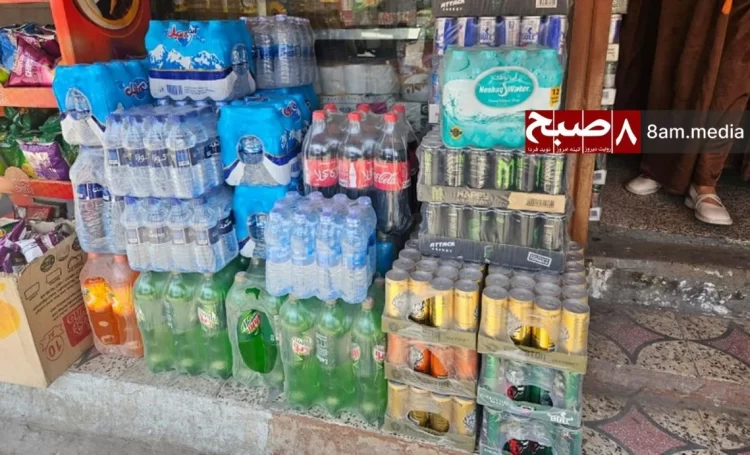 Energy drinks and bottled beverages are displayed at a Kabul shop, reflecting the widespread availability of these products across Afghanistan despite growing health concerns raised by medical experts. (Photo Credit: 8am.media)