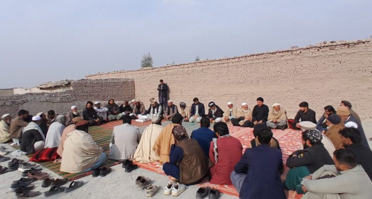 Community meeting in Sheikh Misri, Nangarhar Province, discussing new solar-powered clean water supply network. (Photo Credit: UNHabitatAf)