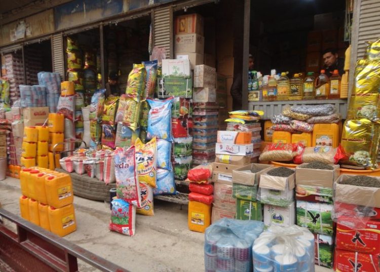 Packed food items displayed outside a small shop in Kabul as rising prices continue to strain household purchasing power. (Photo Credit: Khaama)