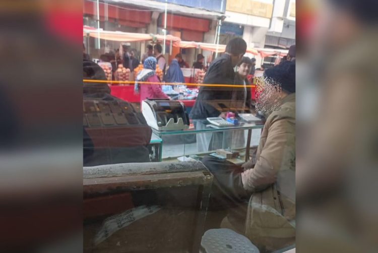 A dismissed female teacher in Balkh province forced to sell goods on the street to survive amid severe poverty and unemployment under Taliban rule. (Photo Credit: Exclusive)