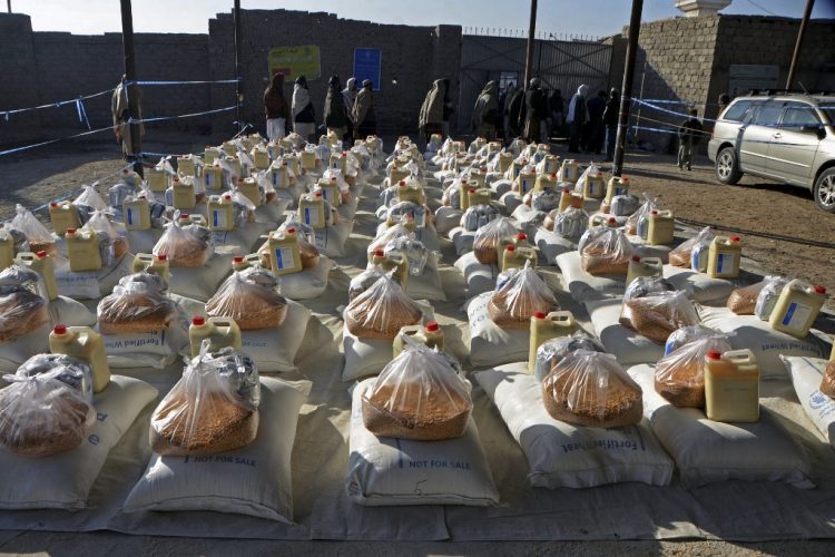 Humanitarian aid packages prepared for distribution in Herat, as residents report widespread diversion and extortion by local strongmen. (Photo Credit: afg-analysts)