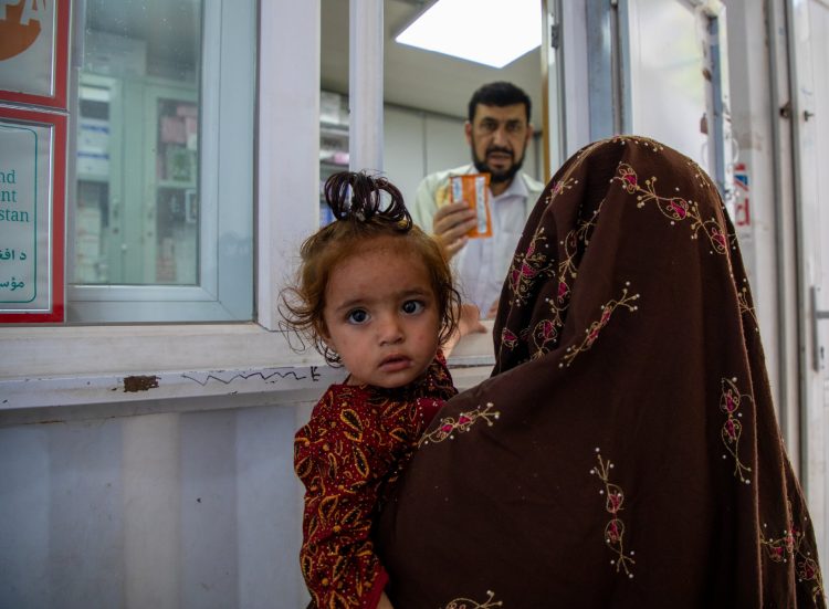Underweight Afghan child with mother at a UN health center for nutrition treatment. Photo Credit: @UNICEFAgf/X