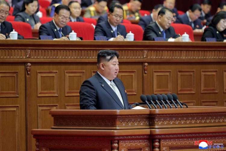Kim Jong Un addresses economic plans at Workers' Party Congress. (Photo Credit: STR / KCNA VIA KNS / AFP)