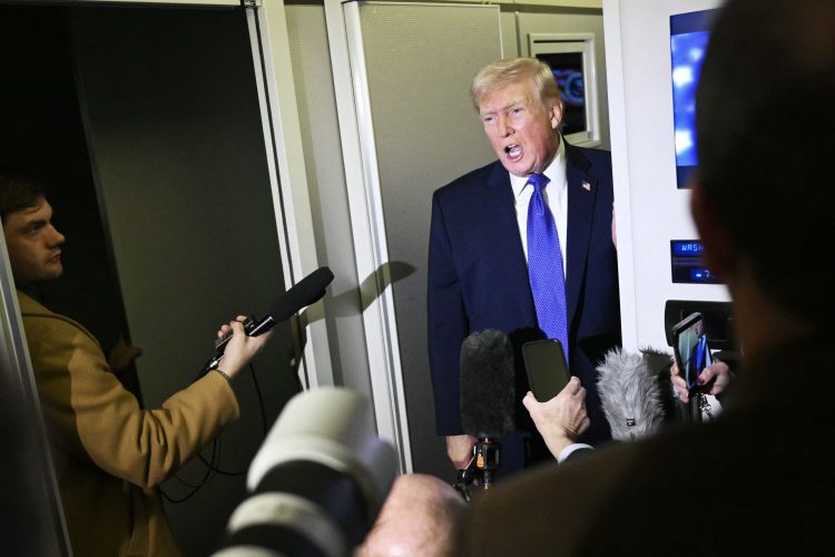 Donald Trump speaks to reporters. Phot Credit: MANDEL NGAN / AFP