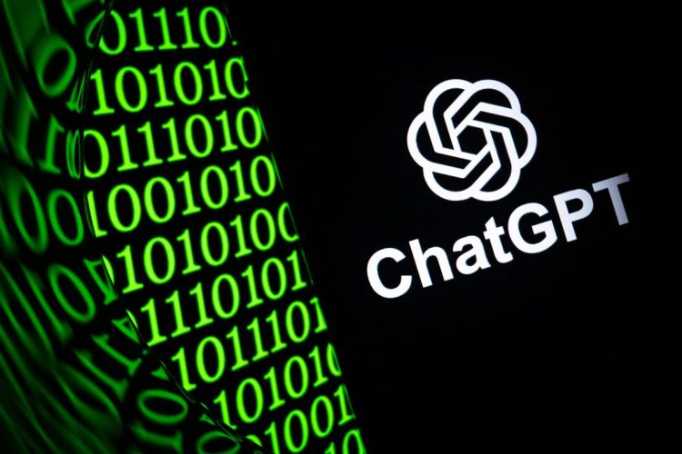 The ChatGPT logo displayed alongside binary code, symbolizing growing concerns over AI misuse in cybercrimes and influence operations. (Photo Credit: SEBASTIEN BOZON / AFP)