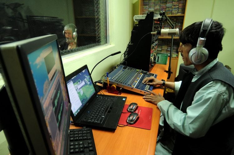 Man at a radio station; today, radio in Afghanistan serves as a Taliban propaganda tool. Photo Credit: United States Air Force