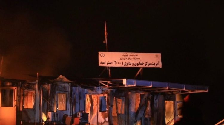 Devastated Kabul drug rehab center after airstrike, with visible destruction and flames under the night sky. (Photo Credit: @FitratHamd)