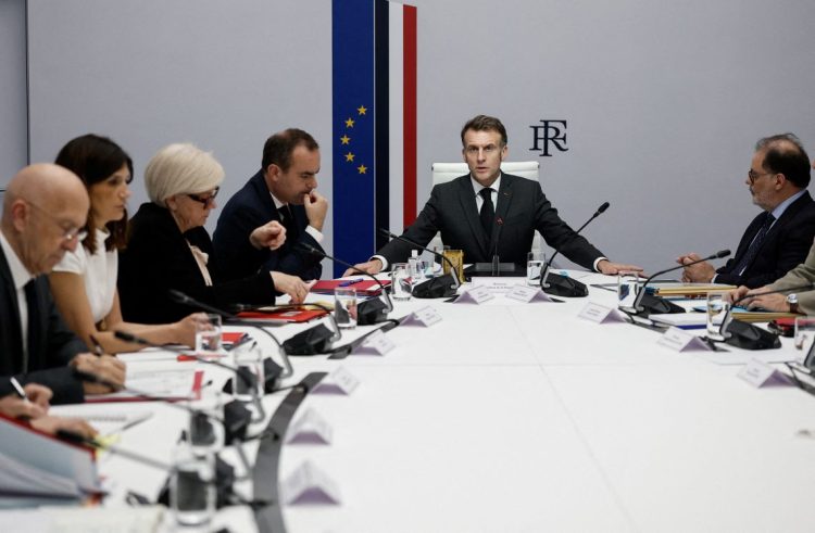 Macron rules out French participation in Strait of Hormuz operations during cabinet meeting. (Photo Credit: BENOIT TESSIER / POOL / AFP)