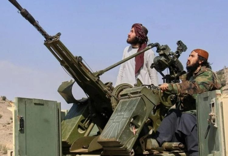 Taliban fighters man an anti-aircraft gun as cross-border tensions with Pakistan escalate into open conflict. (Photo Credit: Reuters)