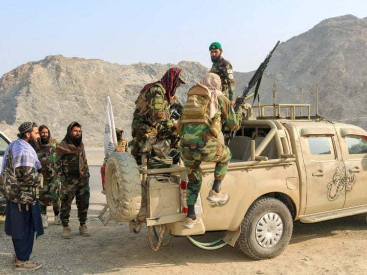 Taliban fighters are seen deployed near the Afghanistan-Pakistan border amid escalating clashes between the two sides, as fighting continues to take a heavy toll on civilians and border communities. (Photo Credit: Al Jazeera)