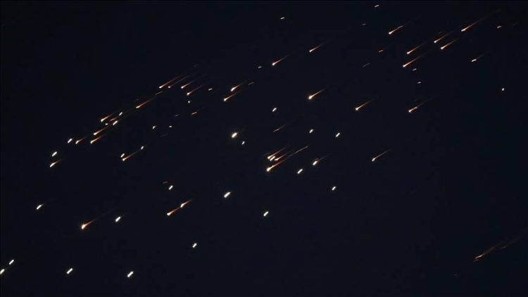 Air defense systems intercept incoming missiles and drones over the UAE amid escalating regional conflict. (Photo Credit: AA)