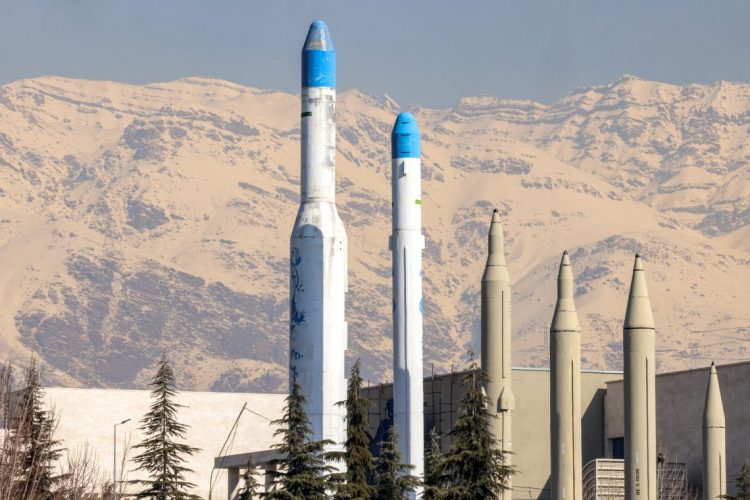 Iranian ballistic missiles on display at a military museum in Tehran, with the Alborz mountain range visible in the background. (Photo Credit: Iranian ballistic)