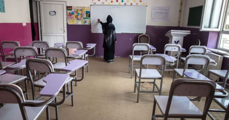 A female teacher cleans a classroom in a girls’ school as female educators in Jawzjan report dismissals, discrimination, and increasing pressure by the Taliban. (Photo Credit: ISOPIX)