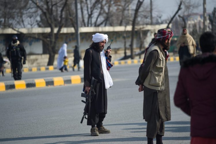 Armed Taliban fighters stand guard on a street in Kabul, Afghanistan, as the group maintains strict control over the country following their takeover. (Photo Credit: AFP)