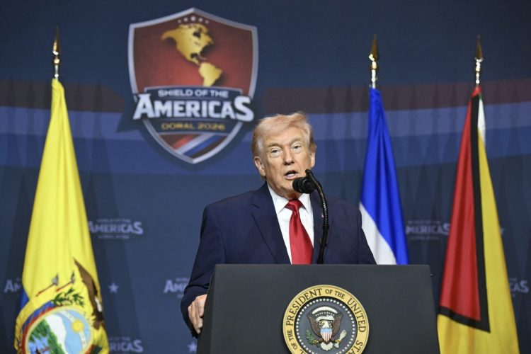 President Donald Trump speaks at the "Shield of the Americas" summit in Doral, Florida, asserting that the United States does not need British military support in the war with Iran. (Photo Credit: SAUL LOEB / AFP)