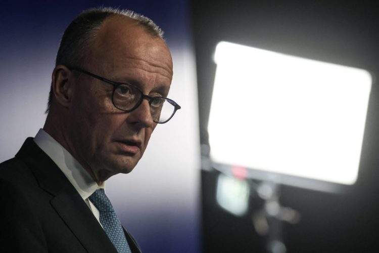 Friedrich Merz close-up portrait during interview (Photo Credit: LUDOVIC MARIN / AFP)