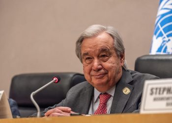 UN Secretary General at podium (Photo Credit: MARCO SIMONCELLI / AFP)