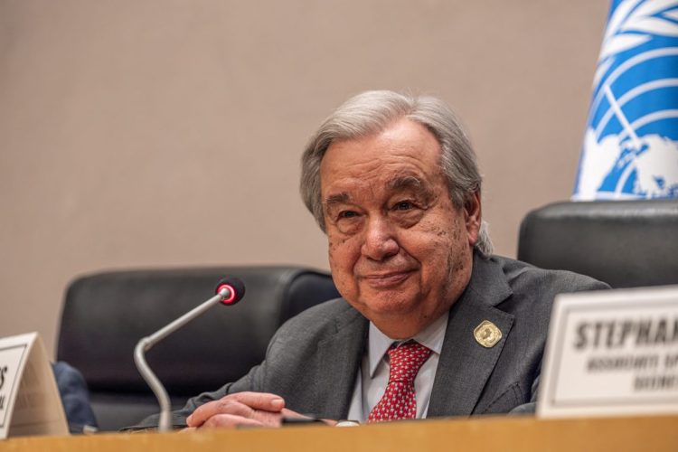 UN Secretary General at podium (Photo Credit: MARCO SIMONCELLI / AFP)