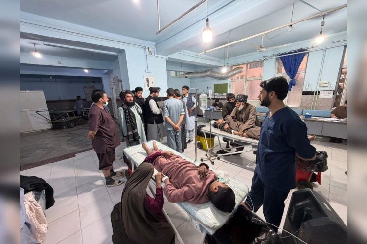 Injured man treated in hospital ward after Herat attack (Photo Credit: Social Media)