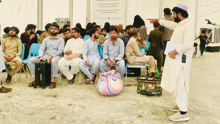 Afghan migrants waiting in camp room after release from Pakistani prisons. Photo Credit: @MoRRAfg