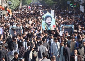 Large crowd carries victims’ photos during Herat protest (Photo Credit: Social Media)