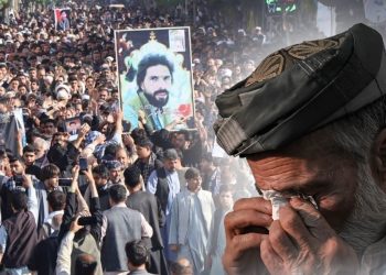 Protest crowd with grieving man during unrest (Photo Credit: Social media+AFP)