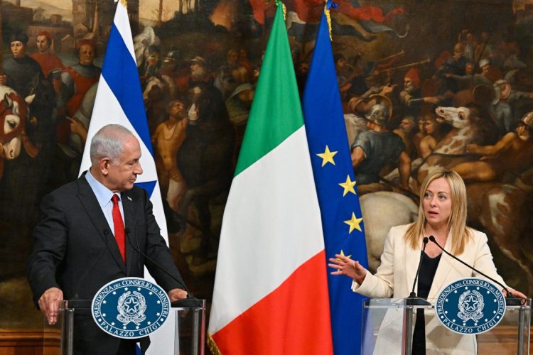 Netanyahu Meloni podium (Photo Credit: ALBERTO PIZZOLI / AFP)